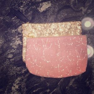 two small makeup bags